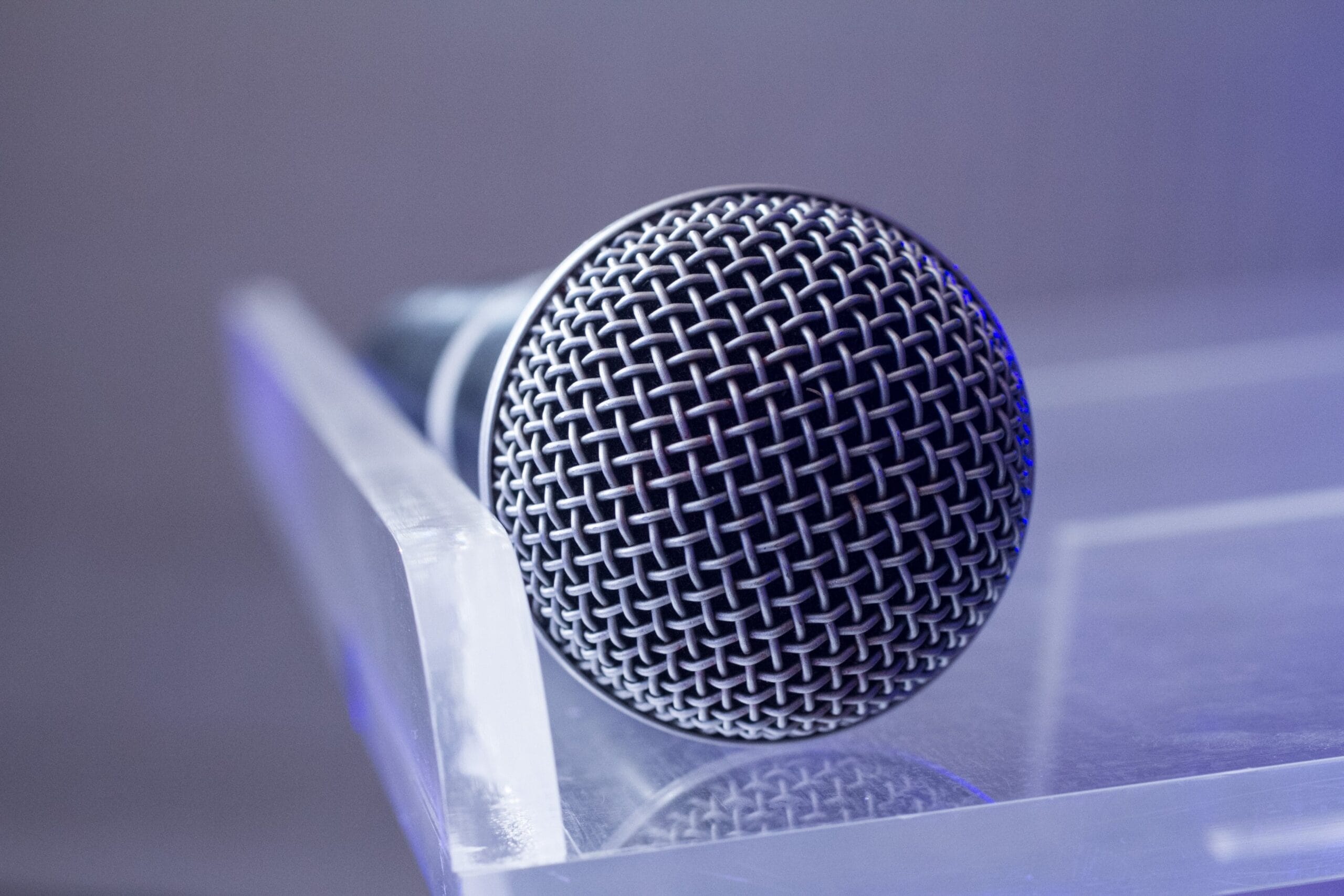 Virtual admin assistance services — A microphone, depicting speech or audio annotation. There are different aspects of speech or audio annotation, which include: transcription, part-of-speech tagging, named entity recognition (NER), dialog act annotation, speech emotion recognition and acoustic event detection.